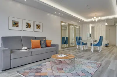 a living room with a couch and a table at Torre Palace II by Atlantic Holiday in Câmara de Lobos
