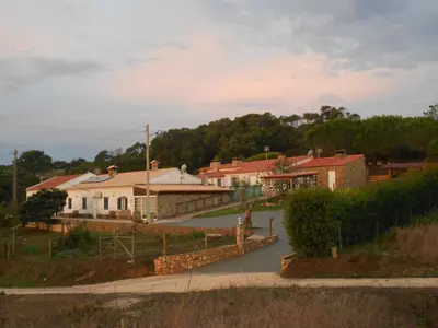 a small town with houses and a bridge at Monte Chabouco - Alojamento Local in Chabouco