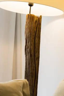 a close up of a lamp with a wooden pole at Fisherhouse23 in Câmara de Lobos