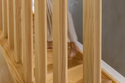 a person walking down the stairs through a wooden closet at Fisherhouse23 in Câmara de Lobos