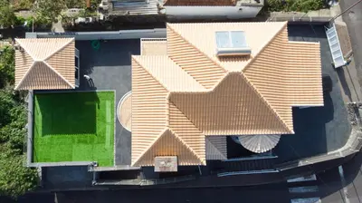 an overhead view of a house with a roof at Villa Machico Valley in Machico