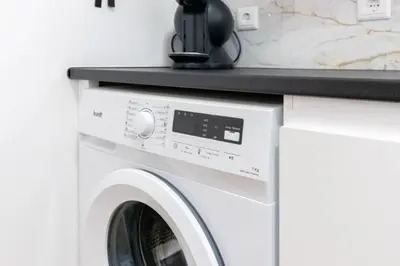 a camera on top of a washing machine at Villa Machico Valley in Machico