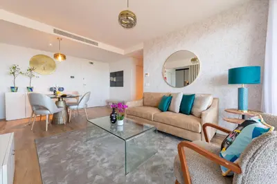 a living room with a couch and a table at The King Apartment By Sam Houses in Funchal