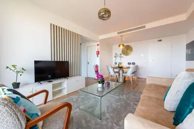 a living room with a couch and a table at The King Apartment By Sam Houses in Funchal