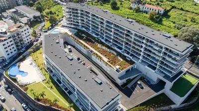 an aerial view of a large building in a city at The King Apartment By Sam Houses in Funchal