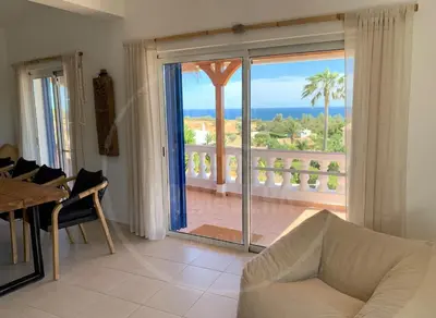 a view of the ocean from a resort at Exklusive Luxusvilla - Meerblick - beheizter Pool in Mato Porcas
