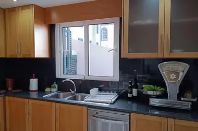 a kitchen counter with a sink and a window at Casa Monte Ponta do Sol SeaViews in Ponta do Sol