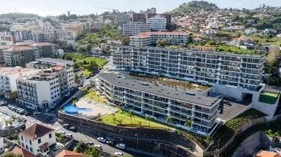 an aerial view of a city with buildings at The Princess Apartment By Sam Houses in Funchal