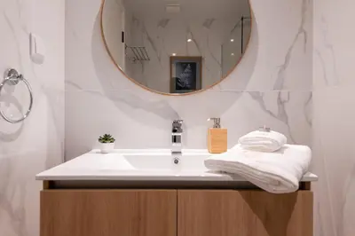 a bathroom with a sink and a mirror at The Prince Apartment By Sam Houses in Funchal