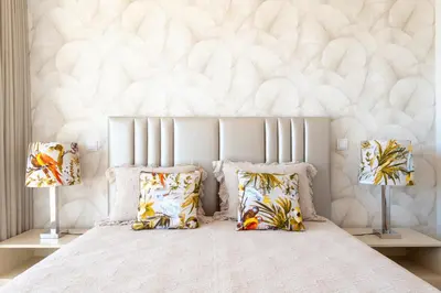 a bedroom with a white bed with two lamps at The Prince Apartment By Sam Houses in Funchal