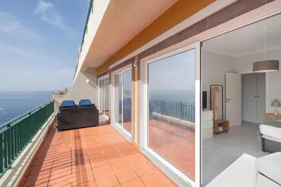 a balcony with a view of the ocean at Doca do Cavacas I by An Island Apart in Funchal