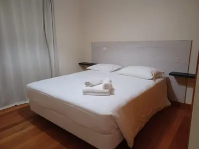 a bedroom with a bed with towels on it at Ocean Paradise Til II in Funchal