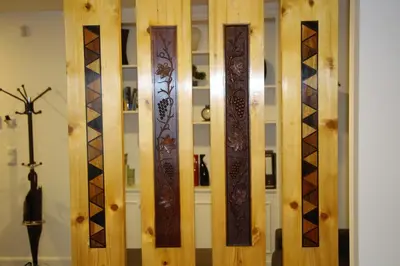 a row of wooden skis in a room at Guest house Santa Maria in Funchal