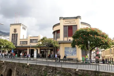 a group of people standing in front of a building at Guest house Santa Maria in Funchal