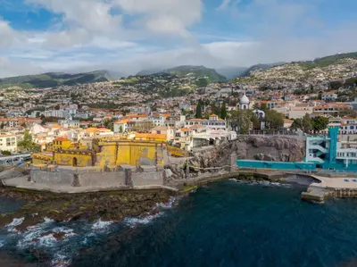 an aerial view of a city with a body of water at Marias Place by Atlantic Holiday in Funchal