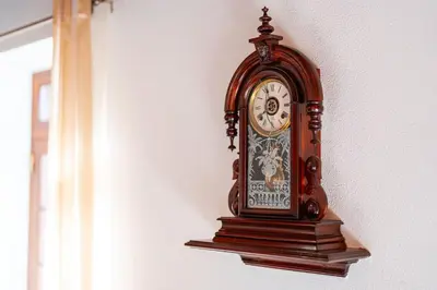 a grandfather clock is hanging on a wall at Casa Lucas by Stay Madeira in Ponta do Sol