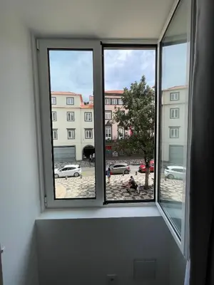 a room with a bed and a desk with a bed gmaxwell gmaxwell gmaxwell at Esmeralda Holidays Apartments in Funchal