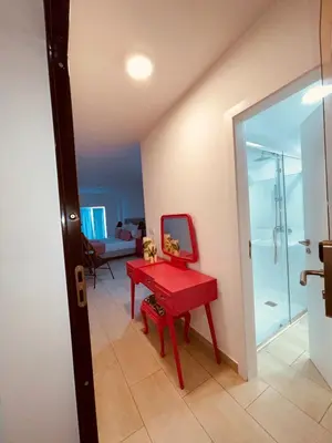 a small kitchen with a sink and a refrigerator at Esmeralda Holidays Apartments in Funchal