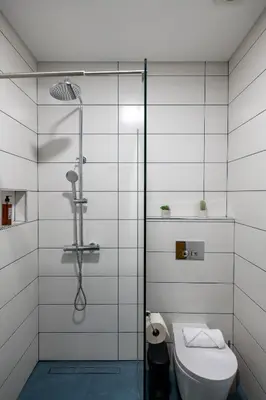 a bathroom with a shower and a toilet at Villa Ocean Haven by AH in Ribeira Brava