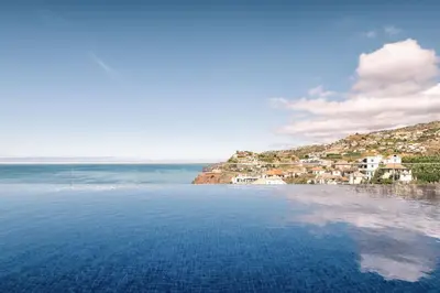 a swimming pool with a view of the ocean at Villa Ocean Haven by AH in Ribeira Brava