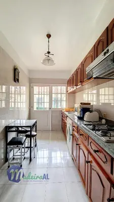a kitchen with a table and a dining room at Linda´s Studio in Funchal