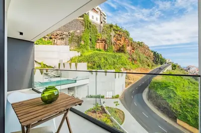 a house with a view of a mountain at CENTRAL LOCATION - WITH POOL in Funchal