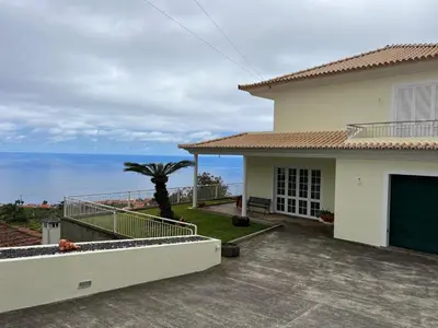 a house with a view of the ocean at Spring House AL in Arco da Calheta