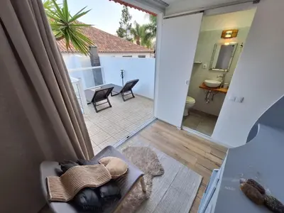 a view of a living room with a view of a bathroom at Happy Stay Funchal in Funchal