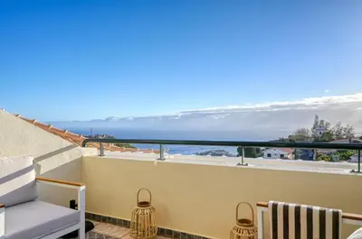 a balcony with a view of the ocean at Pôr do Sol, a Home in Madeira in Ponta do Sol