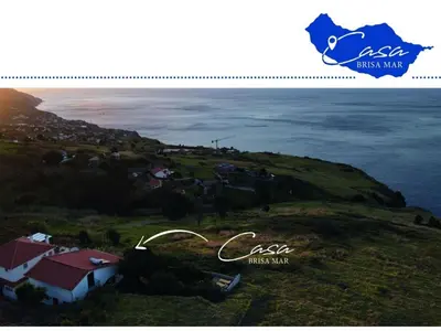 a collage of a picture of a house on a hill with the ocean at Holiday home Casa Brisa Mar in Prazeres in Prazeres