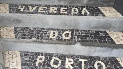 a set of stairs with a sign that says leederbooth at Harbour House in Paul do Mar