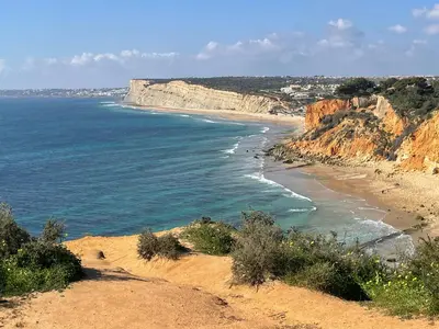 a view of a beach with cliffs and the ocean at Beautiful sea view in Luz