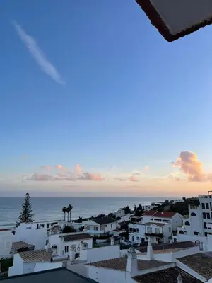 a view of the ocean from a building at Casa Amar- Vista panorâmica in Luz