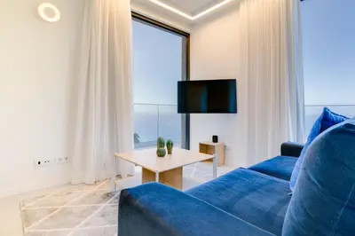 a laundry room with a washer and dryer at Mar Yam View by Atlantic Holiday in Arco de São Jorge