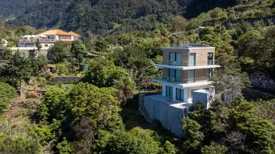 an aerial view of a house on a mountain at Mar Yam View by Atlantic Holiday in Arco de São Jorge