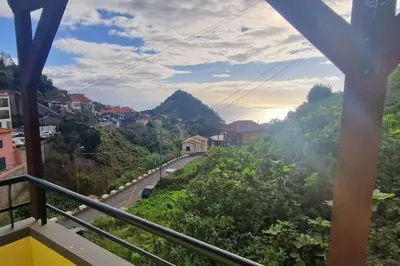 a view from a balcony of a mountain road at casa sousa in Campanário
