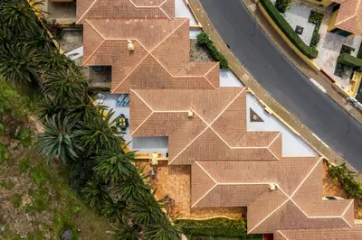 an overhead view of a house with a brown roof at Casa do Ribeiro Salgado by An Island Apart in Porto Santo