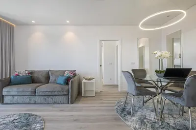 a living room with a couch and a table at Contemporary Residence B by Homie in Funchal