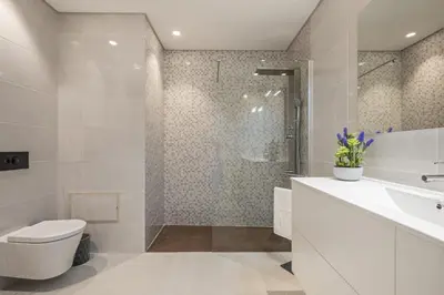 a white bathroom with a toilet and a shower at Contemporary Residence C by Homie in Funchal
