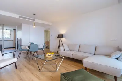 a living room with a couch and a table at GuestReady - The place to be happy in Madeira in Funchal