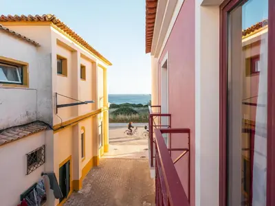a view of the ocean from a balcony of a building at Casa Da Bélgica in Sagres