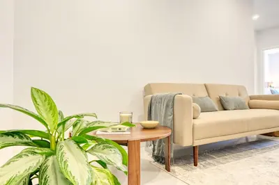 a living room with a couch and a table at Beco Santa Emilia 2G, a Home in Madeira in Funchal