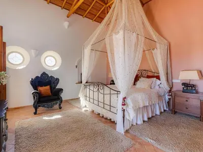 a hallway with a bench and a door with a window at Luxury villa with gym, jacuzzi and swimming pool in Lagos
