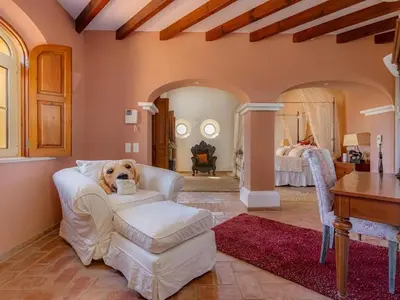 a bedroom with a bed and a window at Luxury villa with gym, jacuzzi and swimming pool in Lagos