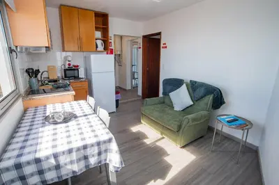 a kitchen with a sink and a stove top oven at Sunset Star II With Sea View in Calheta