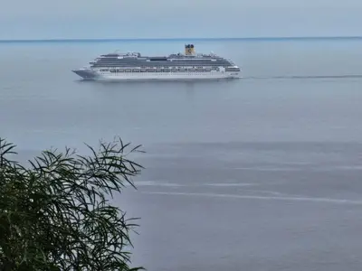 a cruise ship floating in the water at Casa a Torre in Santa Cruz