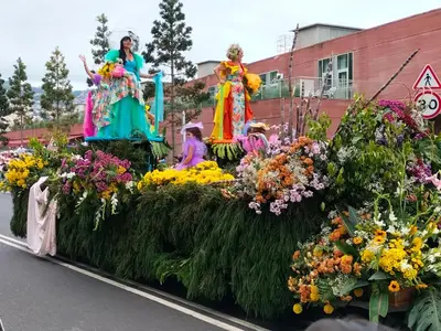 a float in a parade with flowers at CASA Bela Vista in Machico