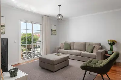 a living room with a couch and a chair at Santa Cruz II by An Island Apart in Santa Cruz