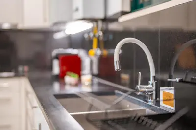 a kitchen counter with a sink and a sink at PAKISA - Three bedroom apartment in Funchal