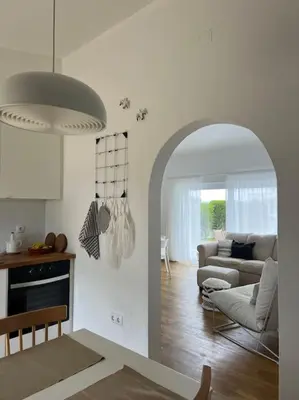 a living room with a couch and a table at Casa de Maio - New T2 - ARRIFANA BEACH 650 mts in Aljezur